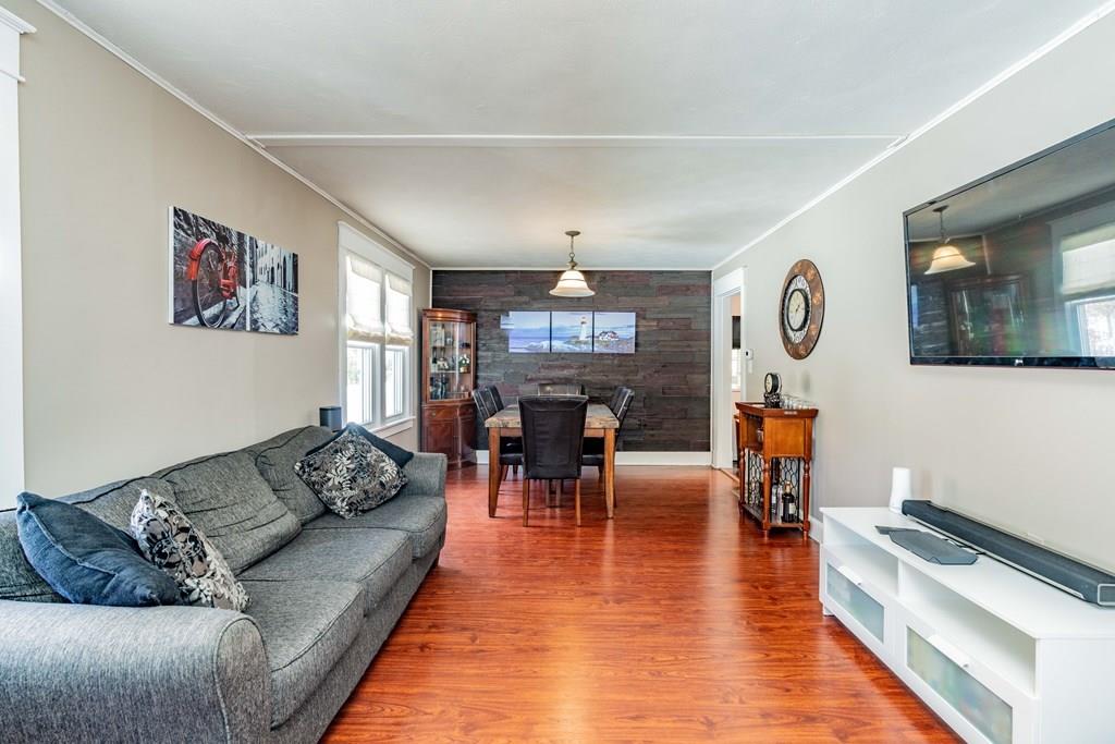 149 Eddy Street Springfield, MA 01104 - Photo 5 of 42 a living room with furniture and wooden floor
