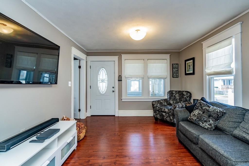 149 Eddy Street Springfield, MA 01104 - Photo 6 of 42 a living room with furniture and a window