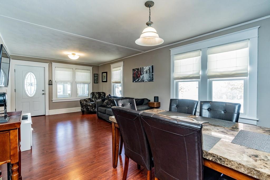 149 Eddy Street Springfield, MA 01104 - Photo 8 of 42 a view of a dining room with furniture window and wooden floor