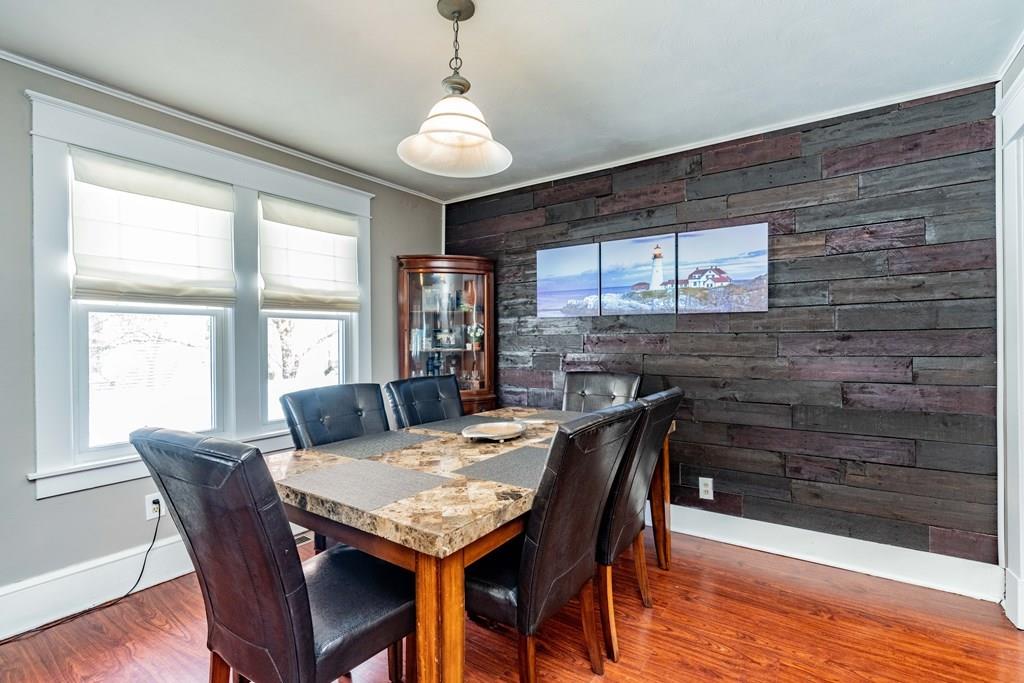 149 Eddy Street Springfield, MA 01104 - Photo 9 of 42 a view of a dining room with furniture window and wooden floor