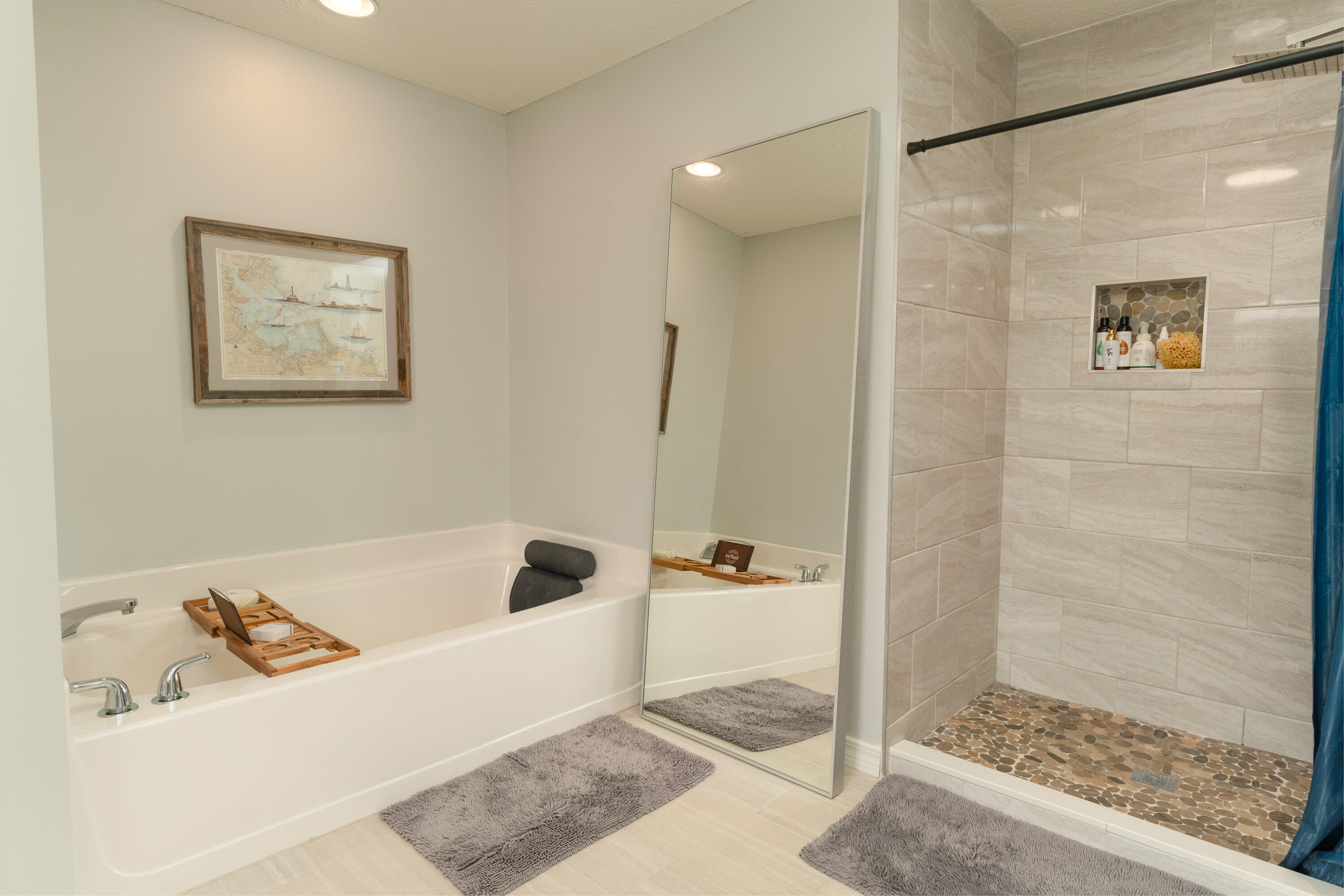 714 Riva Ridge Drive Crestview, FL 32539 - Photo 18 of 37 a bathroom with a tub and a shower