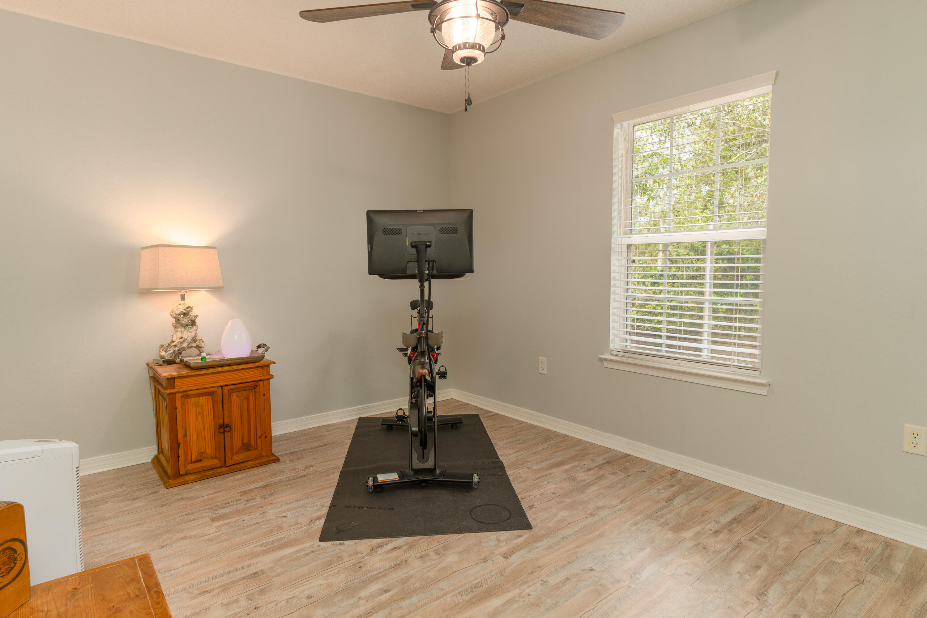 714 Riva Ridge Drive Crestview, FL 32539 - Photo 25 of 37 a living room with furniture and a window