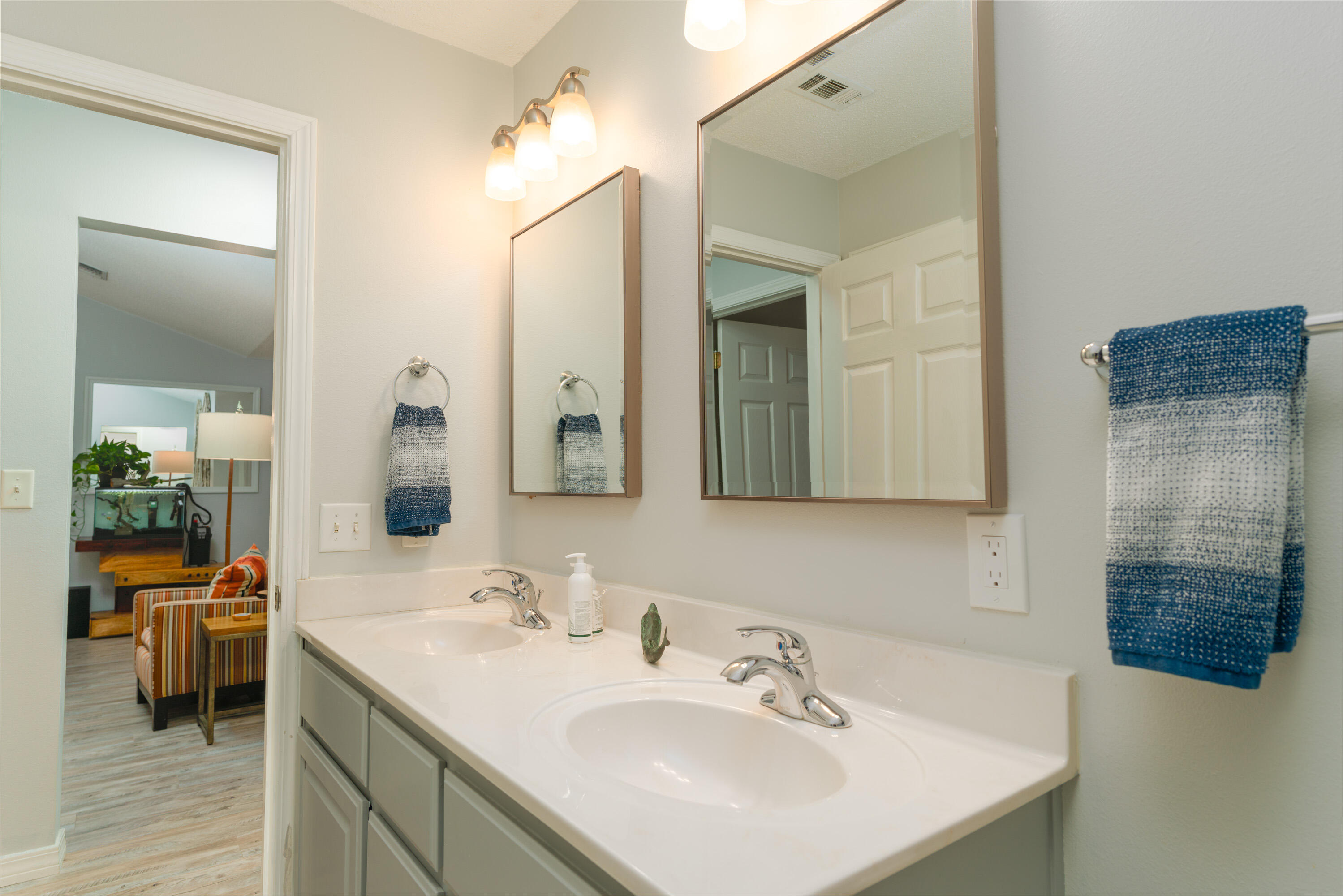 714 Riva Ridge Drive Crestview, FL 32539 - Photo 27 of 37 a bathroom with a sink and a mirror