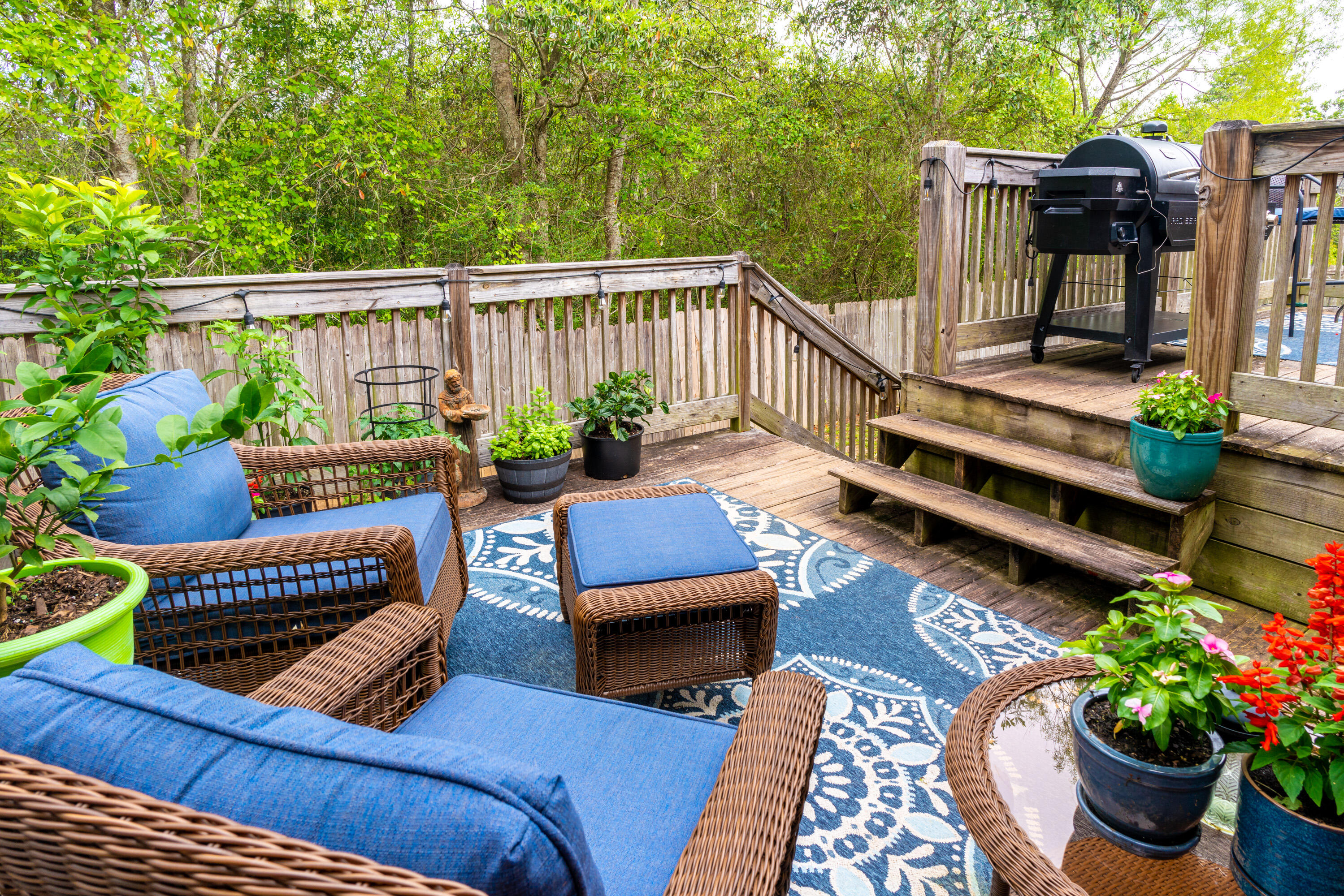 714 Riva Ridge Drive Crestview, FL 32539 - Photo 32 of 37 a view of a patio with couches chairs and wooden floor
