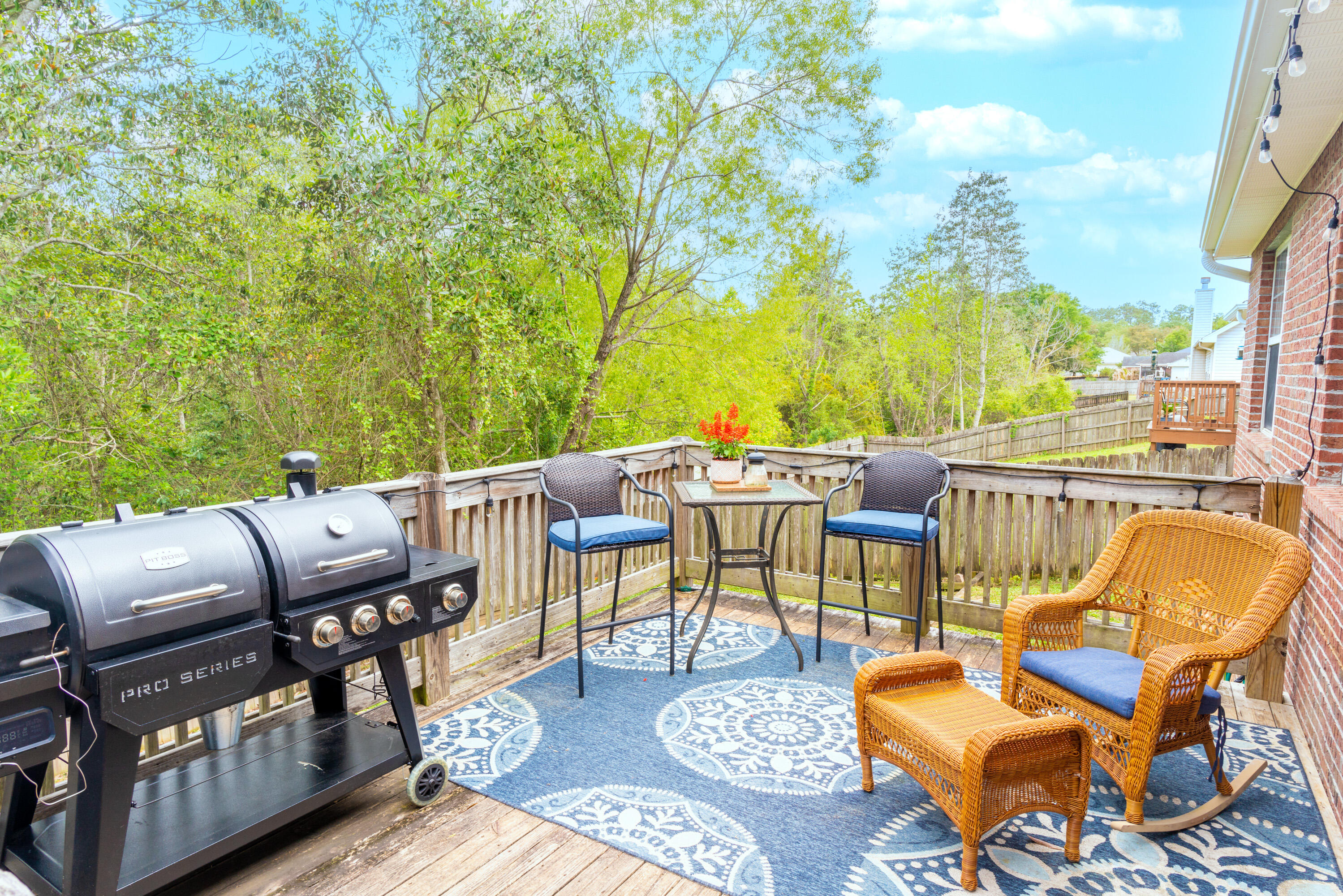 714 Riva Ridge Drive Crestview, FL 32539 - Photo 34 of 37 a view of a patio with lawn chairs