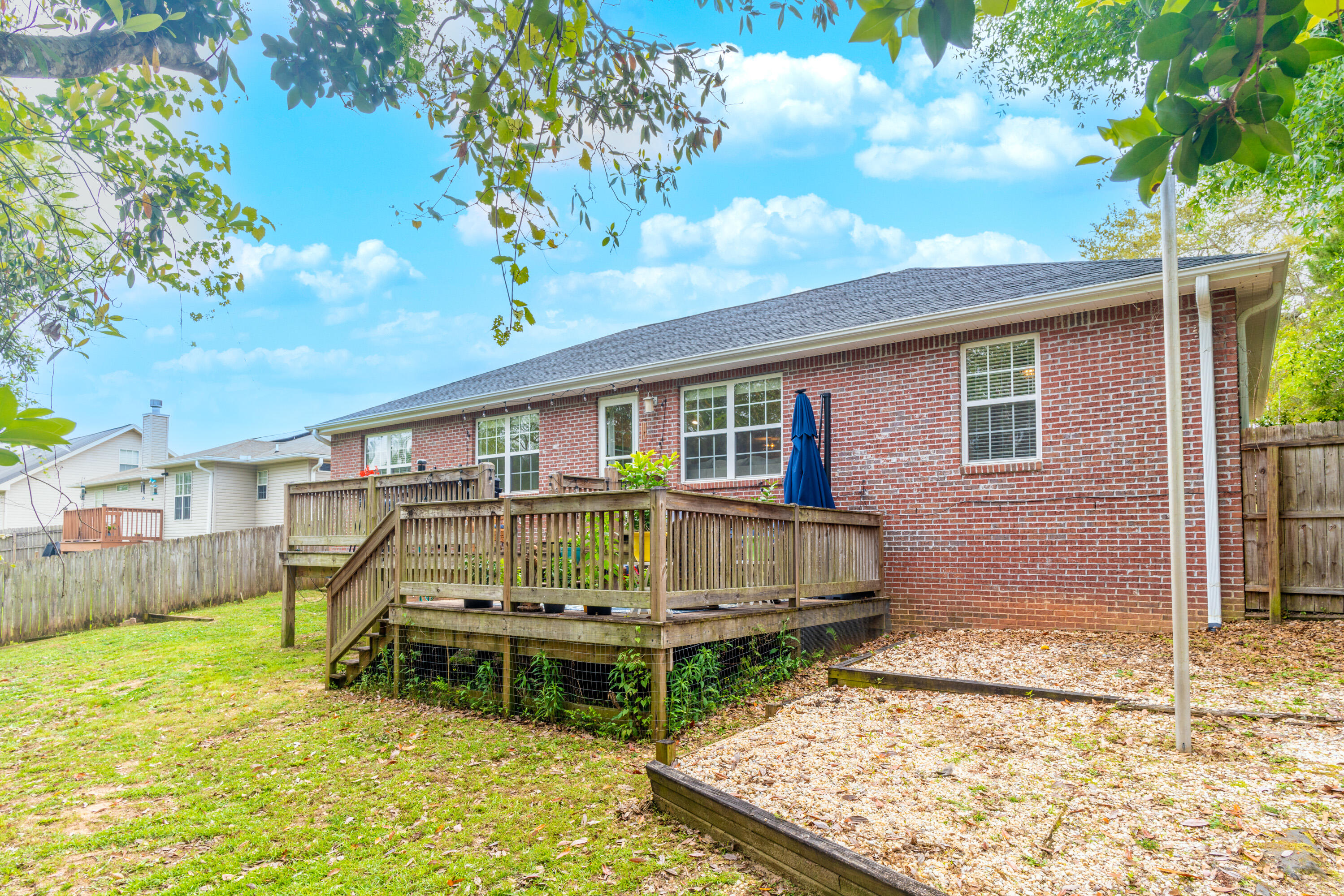 714 Riva Ridge Drive Crestview, FL 32539 - Photo 35 of 37 a view of a house with a yard