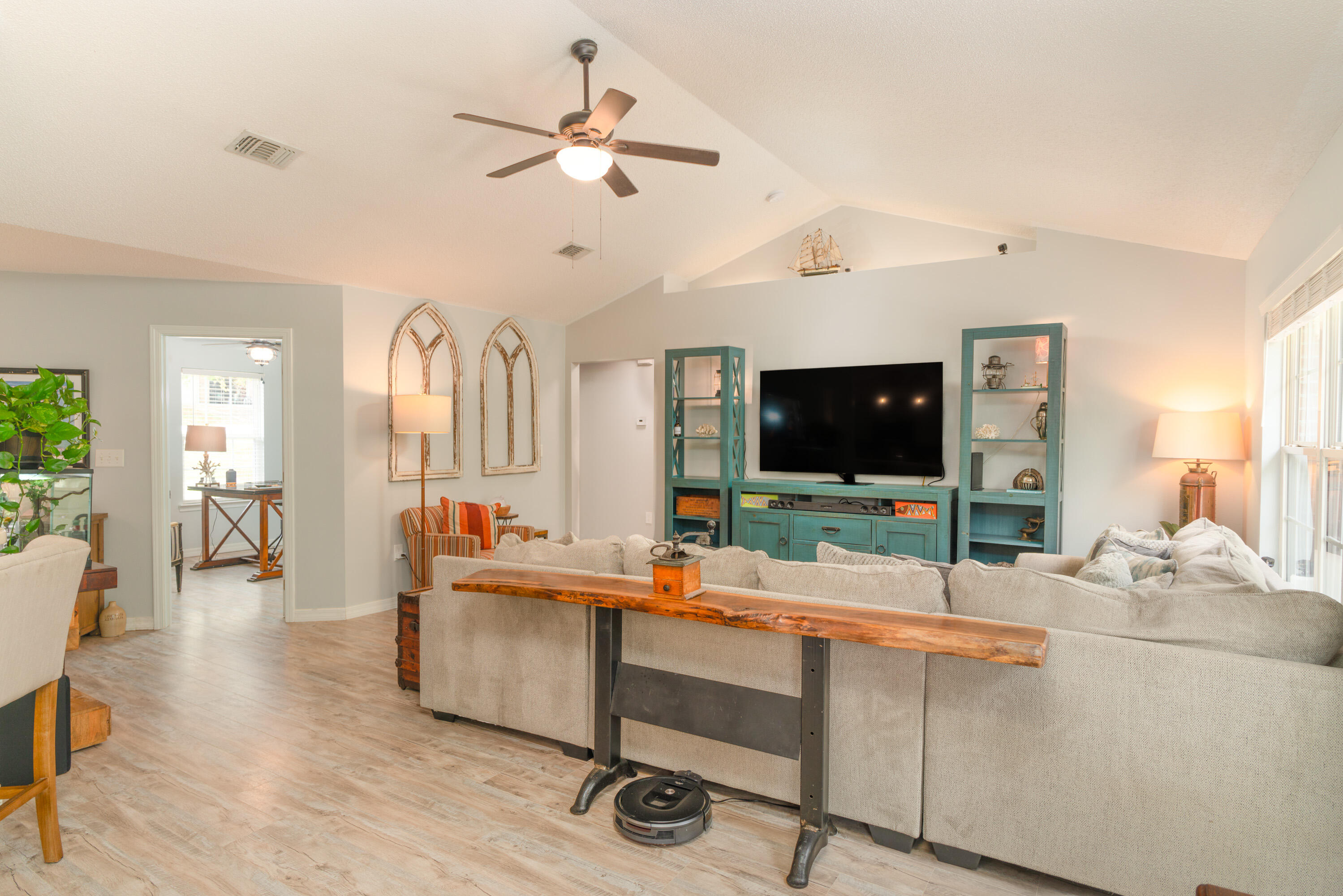 714 Riva Ridge Drive Crestview, FL 32539 - Photo 10 of 37 a living room with furniture and a flat screen tv
