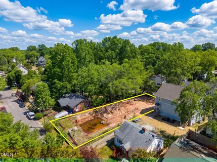 an aerial view of house with yard