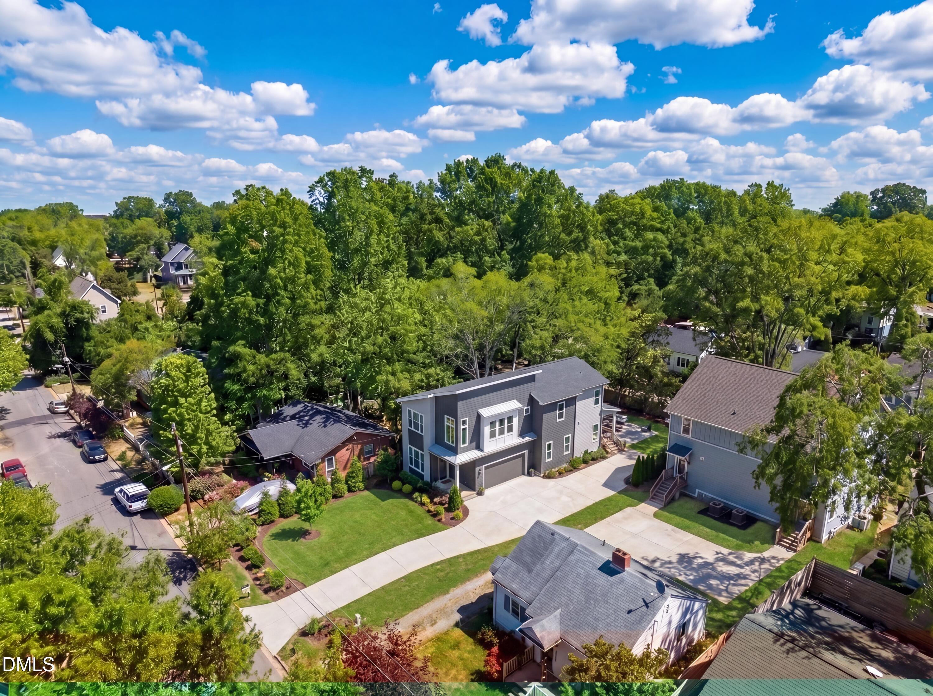 516 North Maple Street Durham, NC 27703 - Photo 4 of 15 an aerial view of a house with garden space and street view