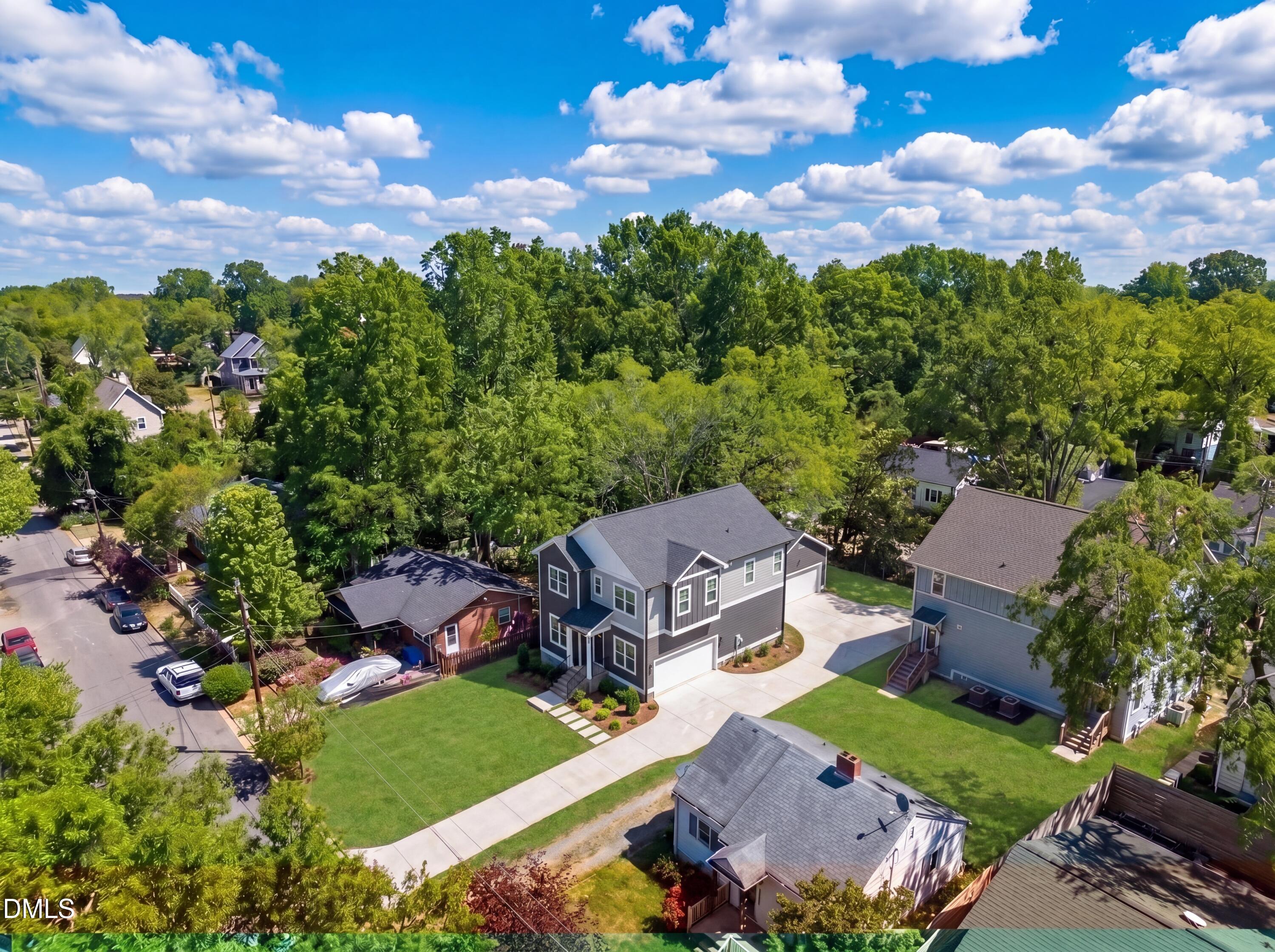 516 North Maple Street Durham, NC 27703 - Photo 5 of 15 an aerial view of a house with garden