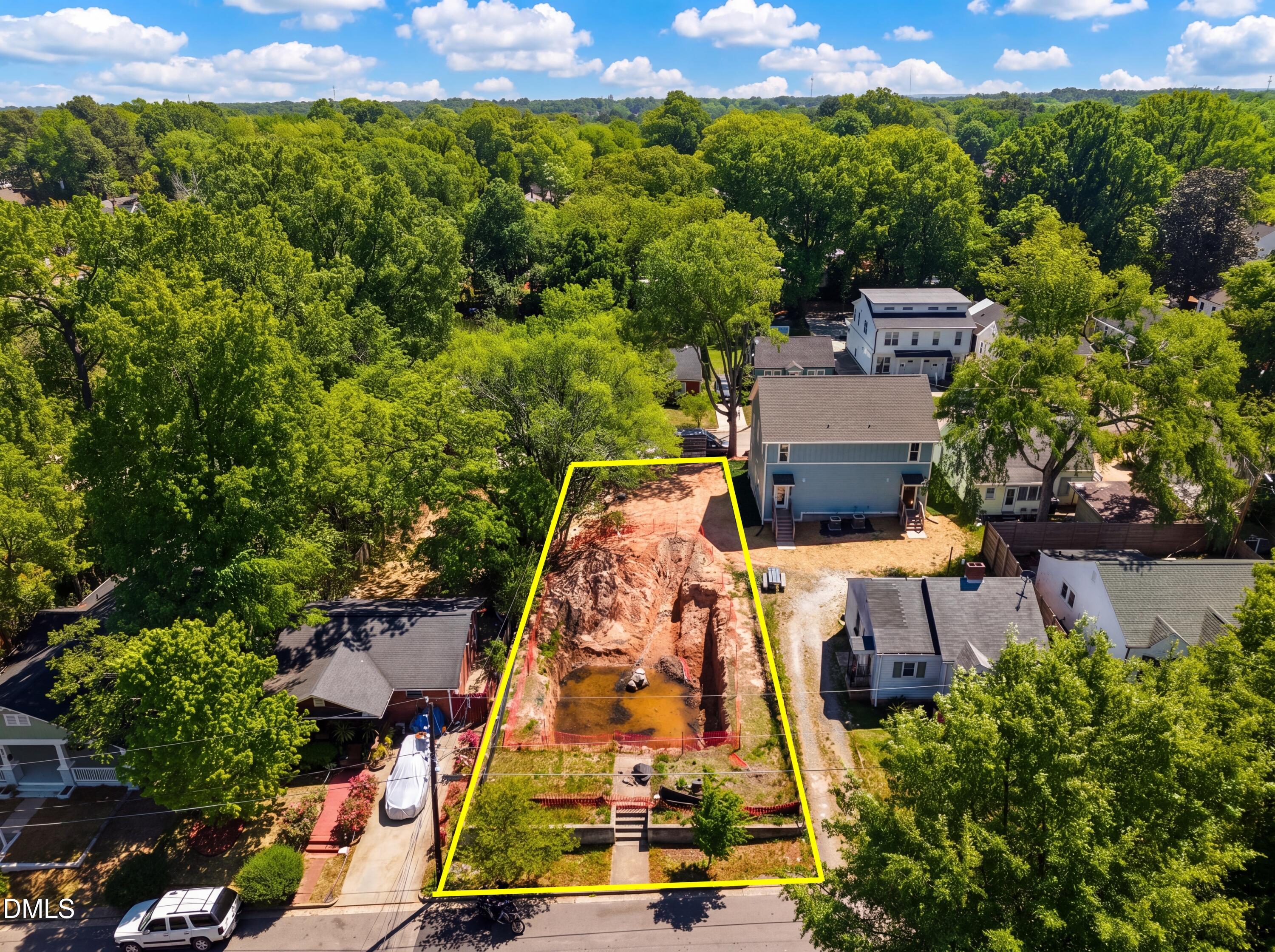 516 North Maple Street Durham, NC 27703 - Photo 6 of 15 an aerial view of a house with a yard