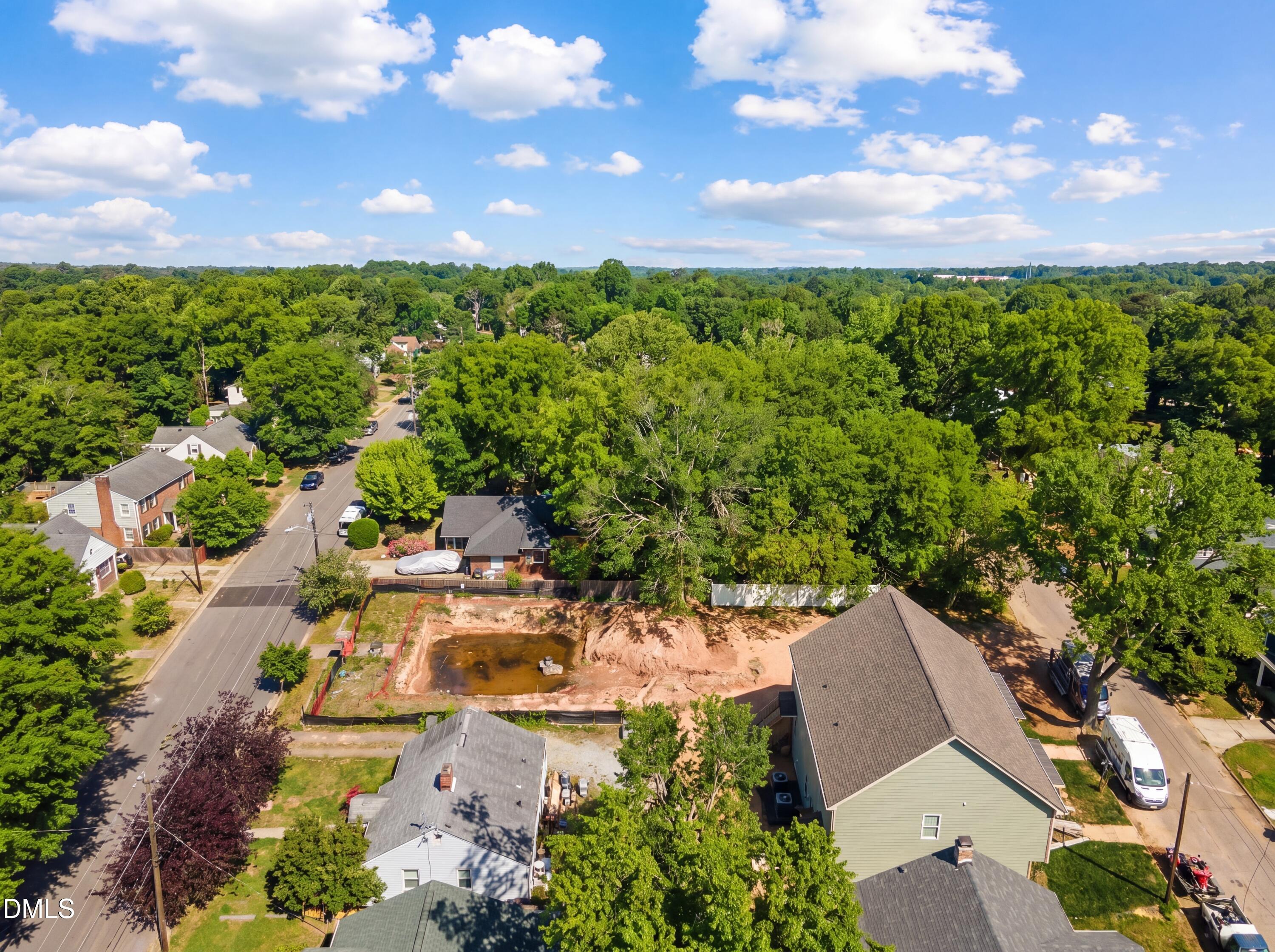 516 North Maple Street Durham, NC 27703 - Photo 7 of 15 a view of a lake with a house