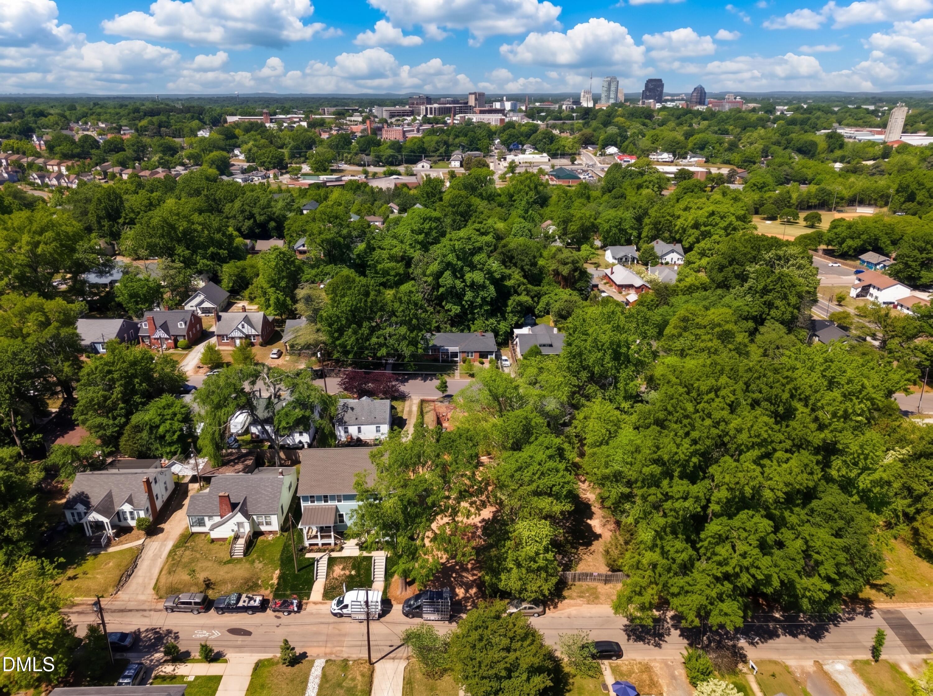 516 North Maple Street Durham, NC 27703 - Photo 9 of 15 an aerial view of a houses with a yard