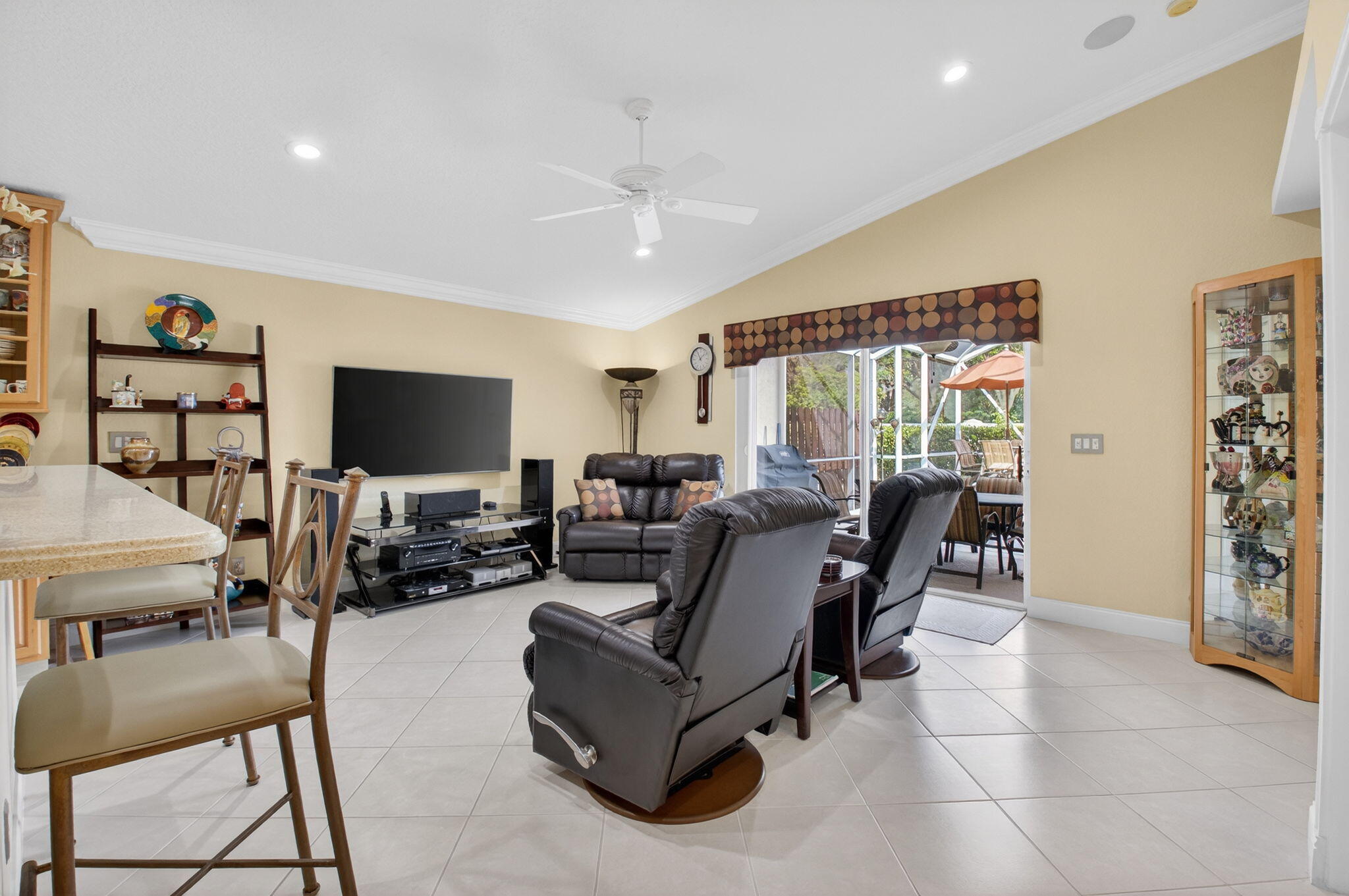 8286 Duomo Circle Boynton Beach, FL 33472 - Photo 15 of 79 a living room with furniture and a flat screen tv