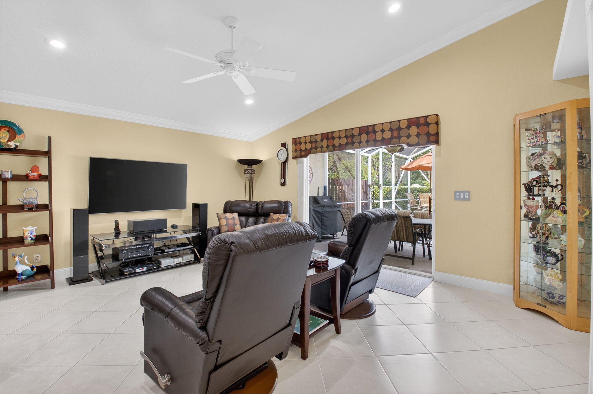 8286 Duomo Circle Boynton Beach, FL 33472 - Photo 16 of 79 a living room with furniture and a flat screen tv