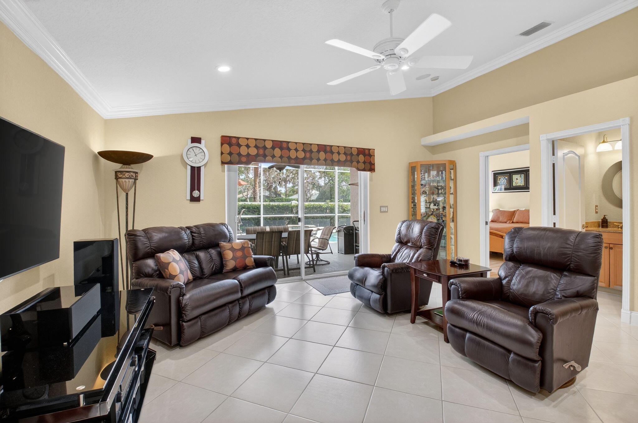 8286 Duomo Circle Boynton Beach, FL 33472 - Photo 17 of 79 a living room with furniture and a flat screen tv