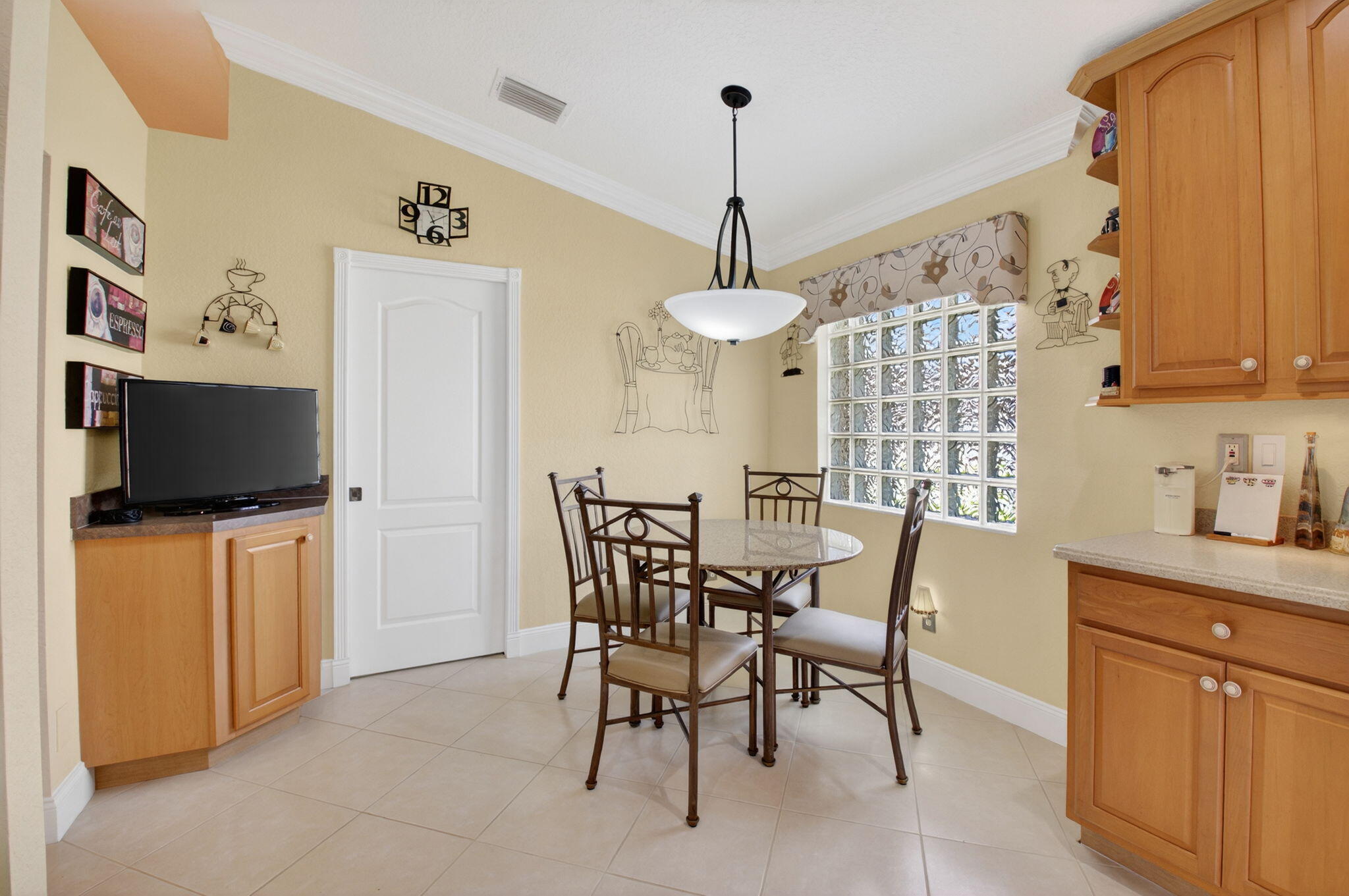 8286 Duomo Circle Boynton Beach, FL 33472 - Photo 23 of 79 a view of a dining room with furniture window and wooden floor