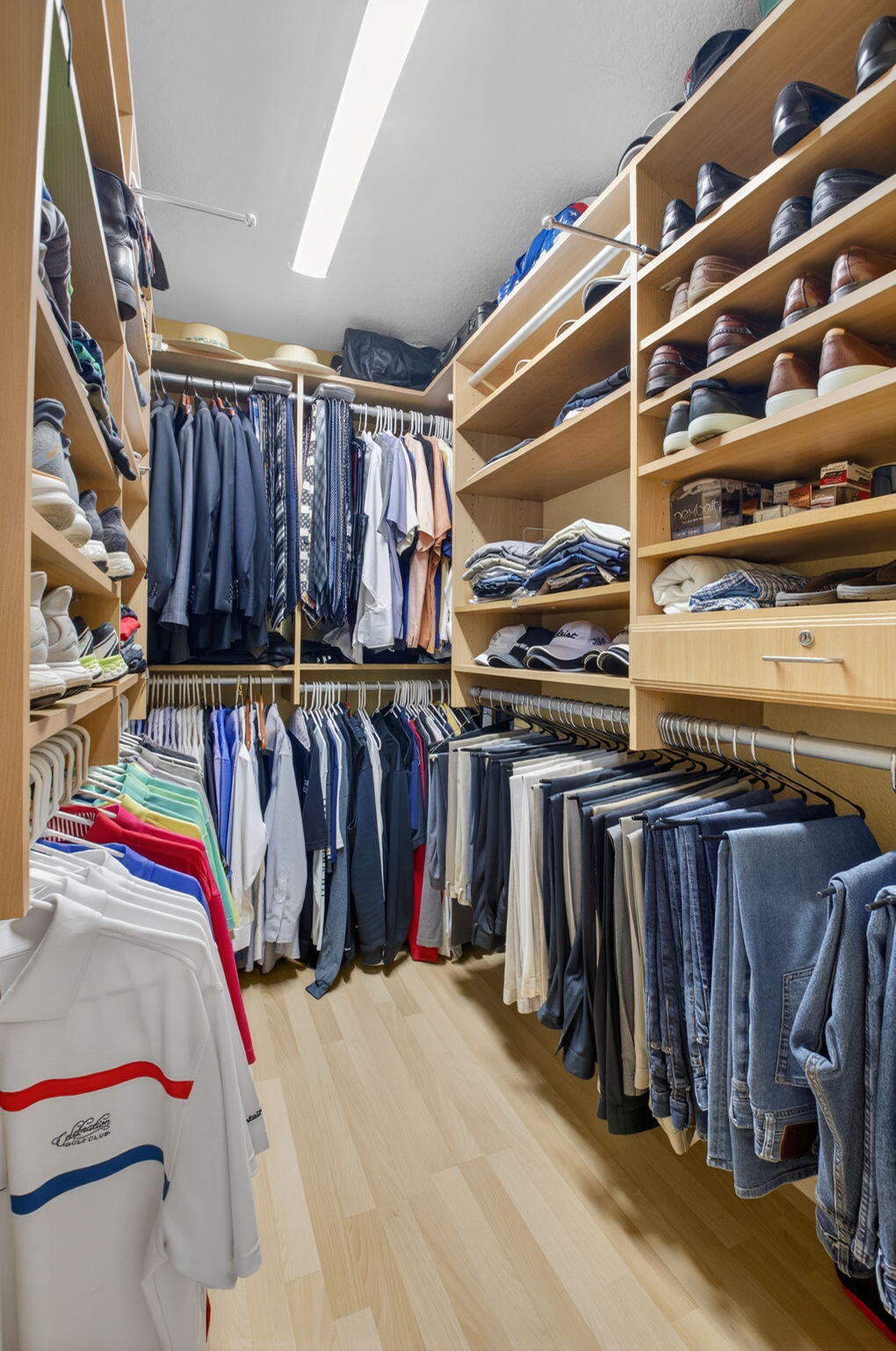 8286 Duomo Circle Boynton Beach, FL 33472 - Photo 28 of 79 a view of walk in closet with clothes and shoes