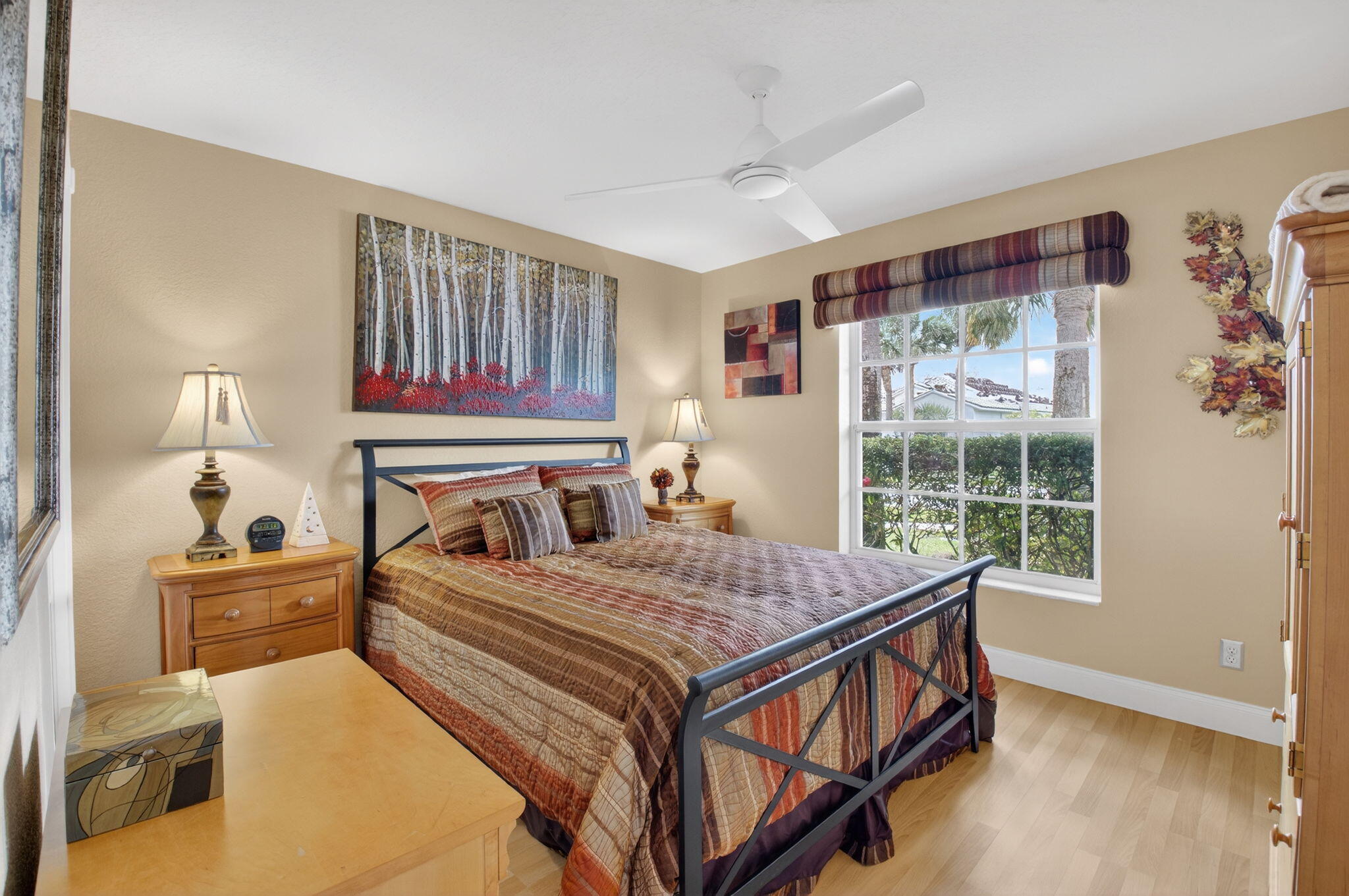 8286 Duomo Circle Boynton Beach, FL 33472 - Photo 32 of 79 a bedroom with a bed and wooden floor