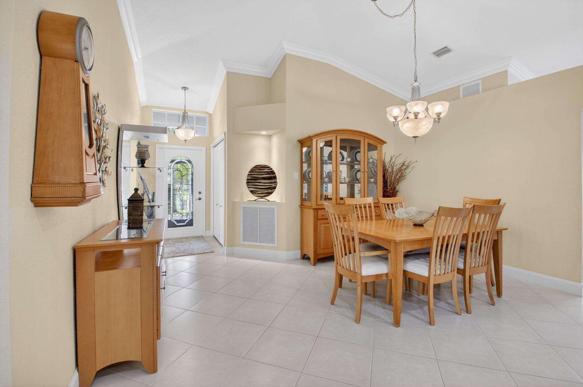 8286 Duomo Circle Boynton Beach, FL 33472 - Photo 7 of 79 a view of a dining room with furniture and chandelier