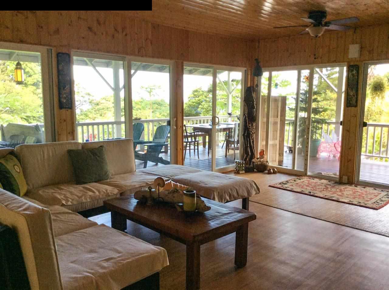 1010 Nahiku Road Hana, HI 96713 - Photo 3 of 13 a living room with furniture and large windows
