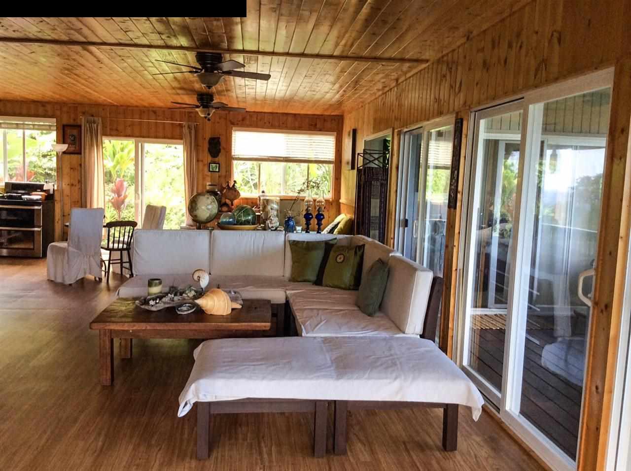 1010 Nahiku Road Hana, HI 96713 - Photo 4 of 13 a view of a dining room with furniture window and wooden floor