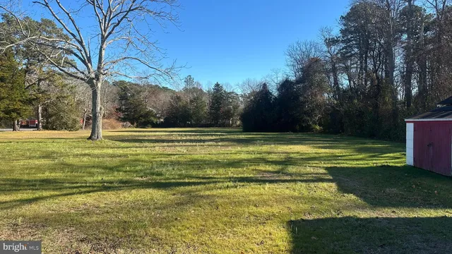 a view of a swimming pool with an outdoor space