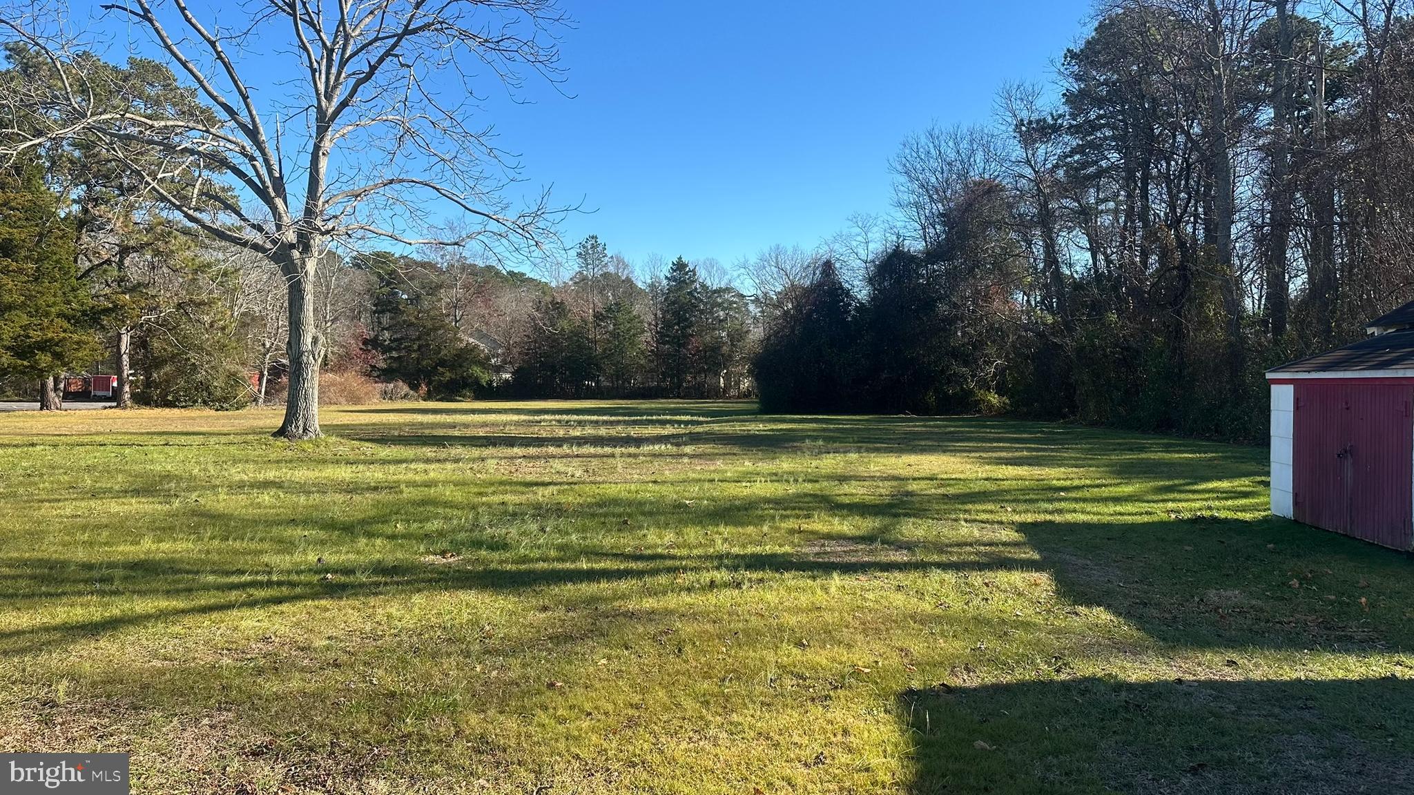 295 North North Main Street Manahawkin, NJ 08050 - Photo 6 of 17 a view of a swimming pool with an outdoor space