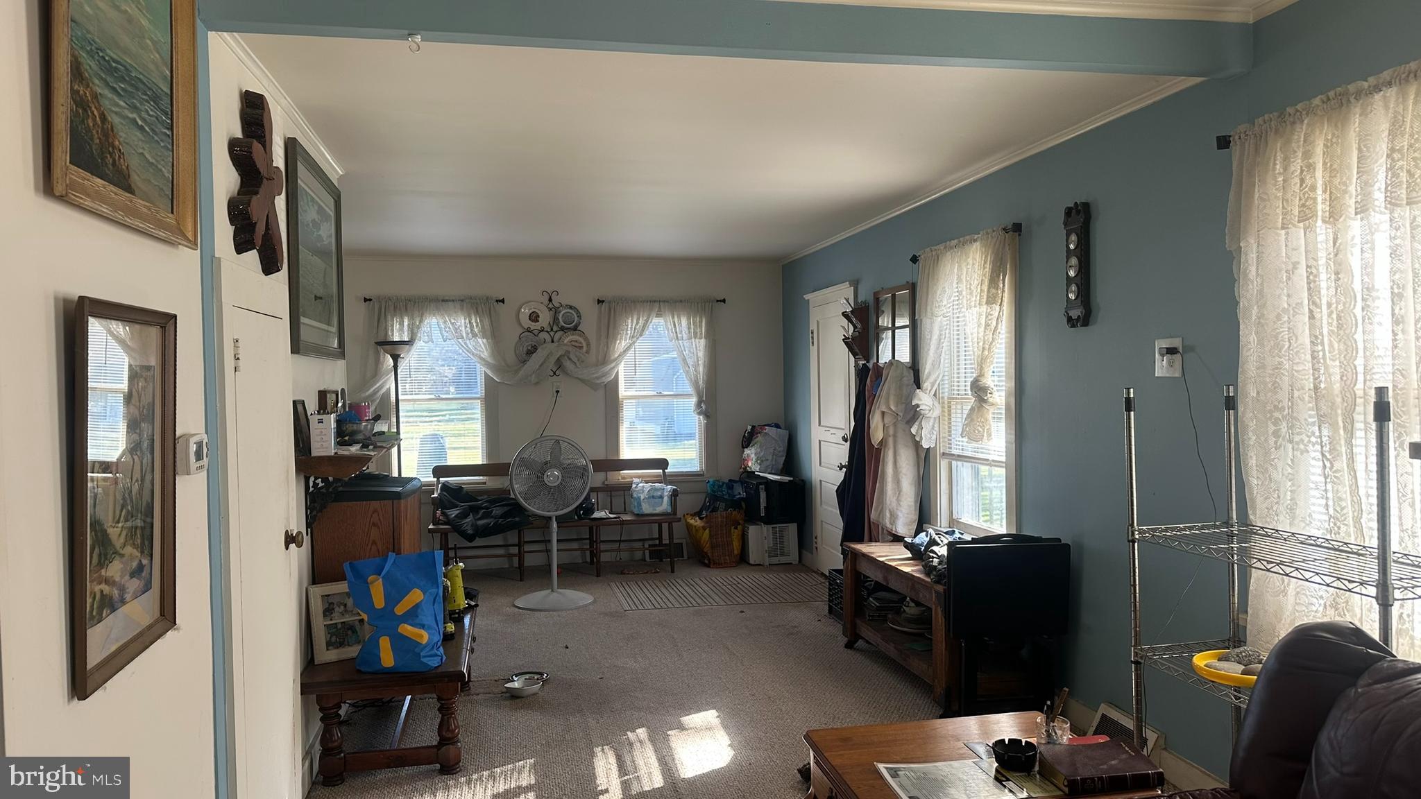 295 North North Main Street Manahawkin, NJ 08050 - Photo 7 of 17 a living room with furniture and a large window
