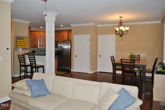 a kitchen with a refrigerator and a sink