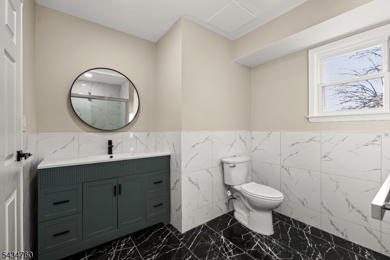 641 Ydv-ham Sq Road Robbinsville, NJ 08691 - Photo 29 of 49 a bathroom with a toilet a sink and mirror
