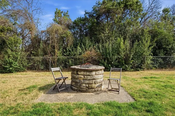 a view of a bench in the garden