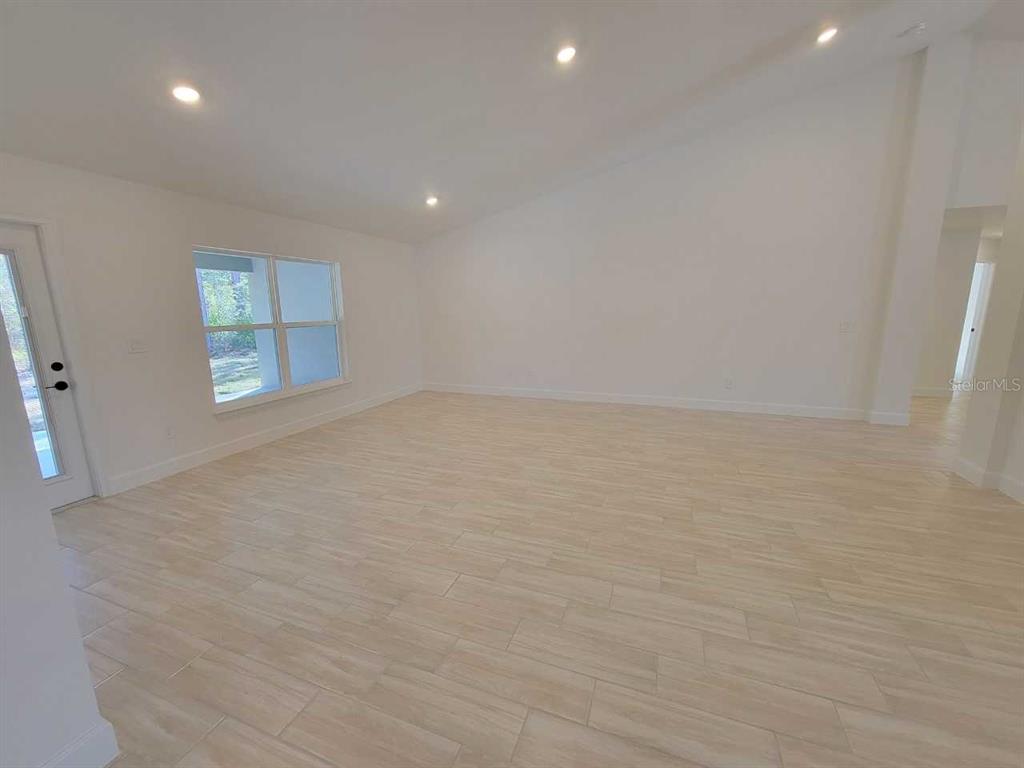7035 Southwest 131st Loop Ocala, FL 34473 - Photo 14 of 28 an empty room with a window