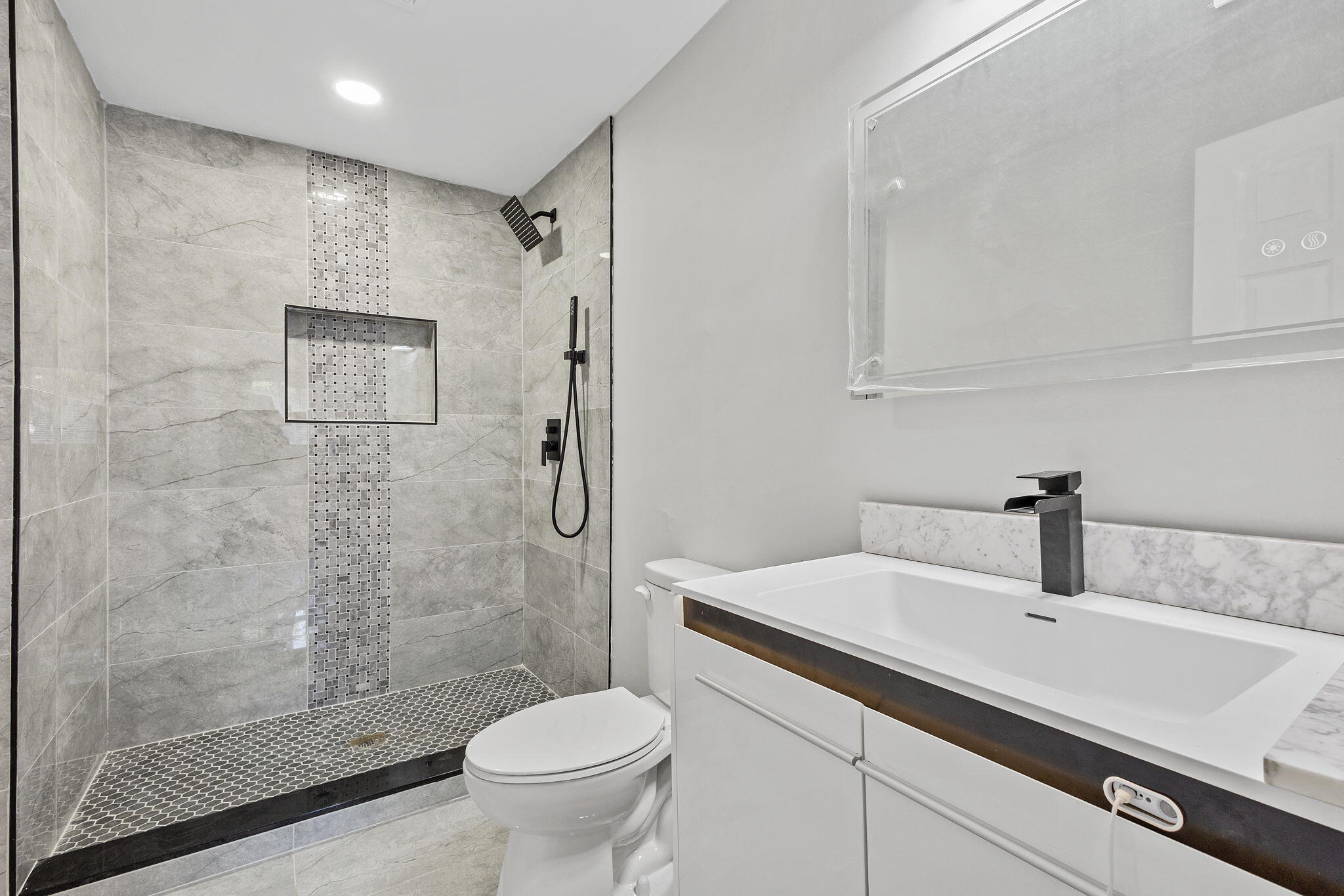 2368 Wheeler Street Gary, IN 46406 - Photo 12 of 16 a bathroom with a sink toilet and shower