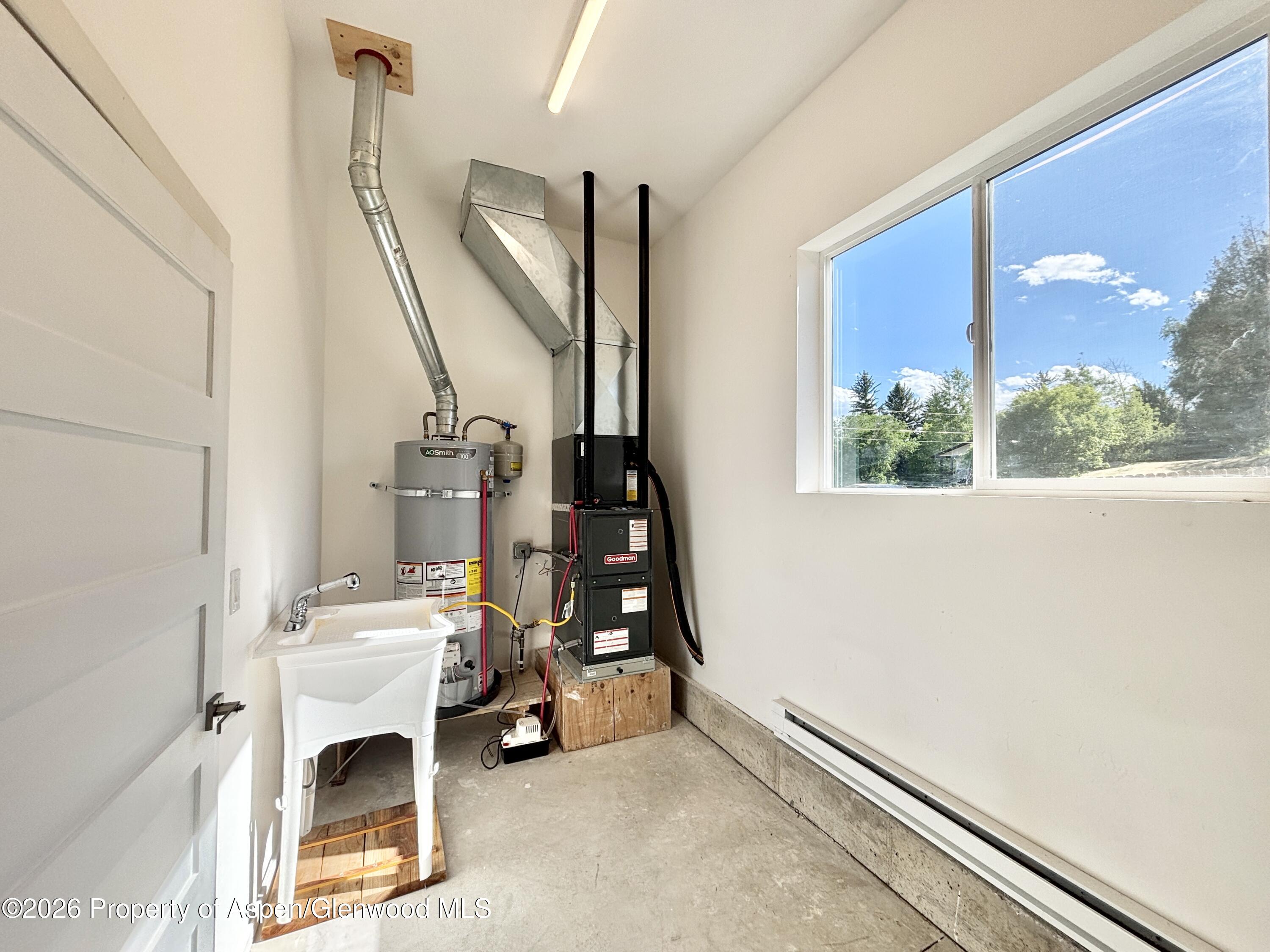 276 Cleveland Street Meeker, CO 81641 - Photo 19 of 21 Utility Sink and Furnance/A/C