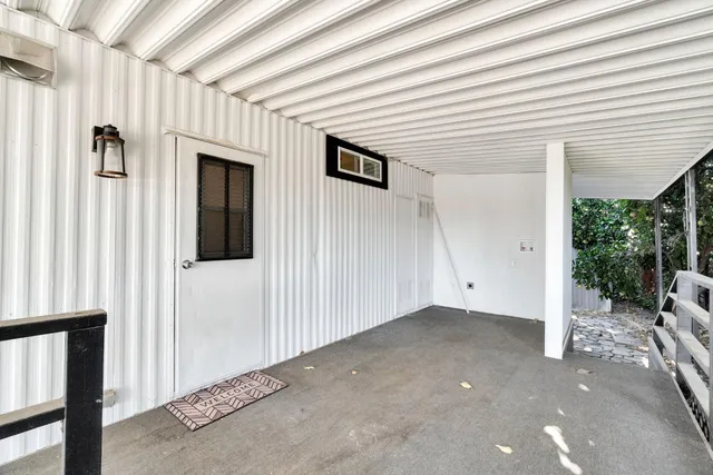 a view of a hallway with entryway