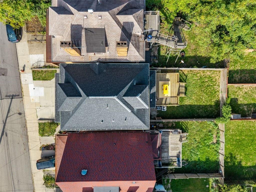 5531 Columbo Street Pittsburgh, PA 15206 - Photo 2 of 34 an aerial view of a house with yard