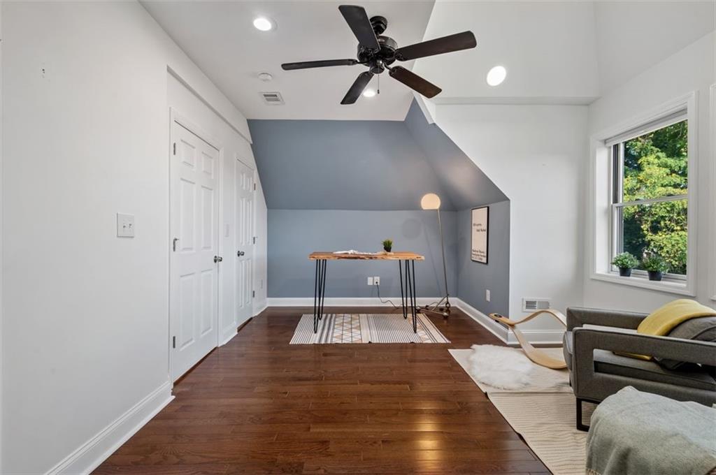 5531 Columbo Street Pittsburgh, PA 15206 - Photo 25 of 34 a living room with a couch and a window