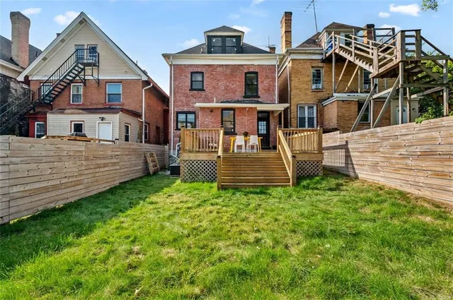 a view of a back yard of the house