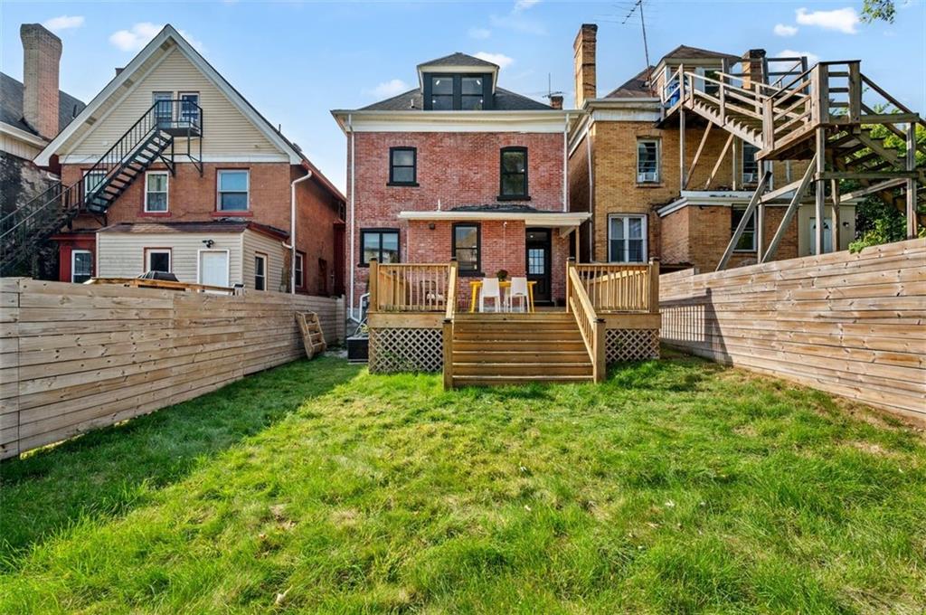 5531 Columbo Street Pittsburgh, PA 15206 - Photo 28 of 34 a view of a house with a yard