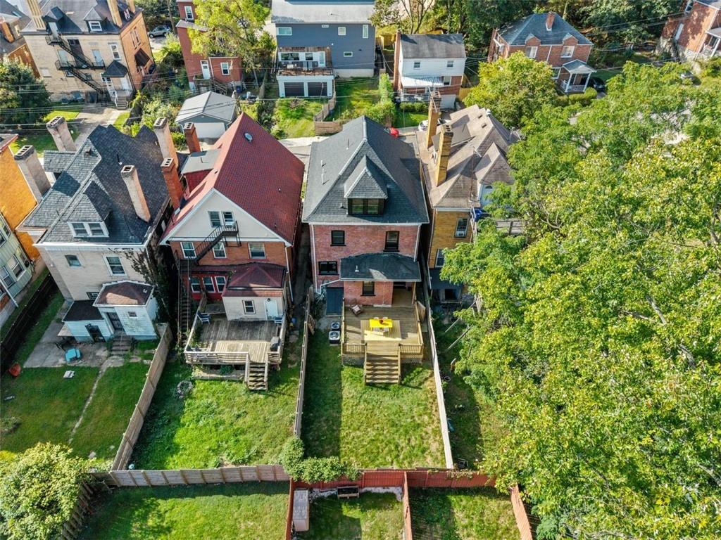 5531 Columbo Street Pittsburgh, PA 15206 - Photo 31 of 34 an aerial view of multiple houses with yard