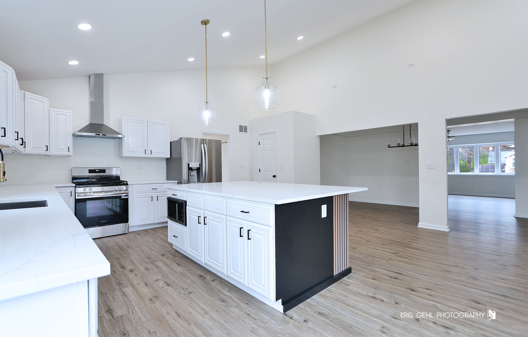 18653 West Willow Point Road Grayslake, IL 60030 - Photo 14 of 49 a kitchen with stainless steel appliances a sink and stove top oven