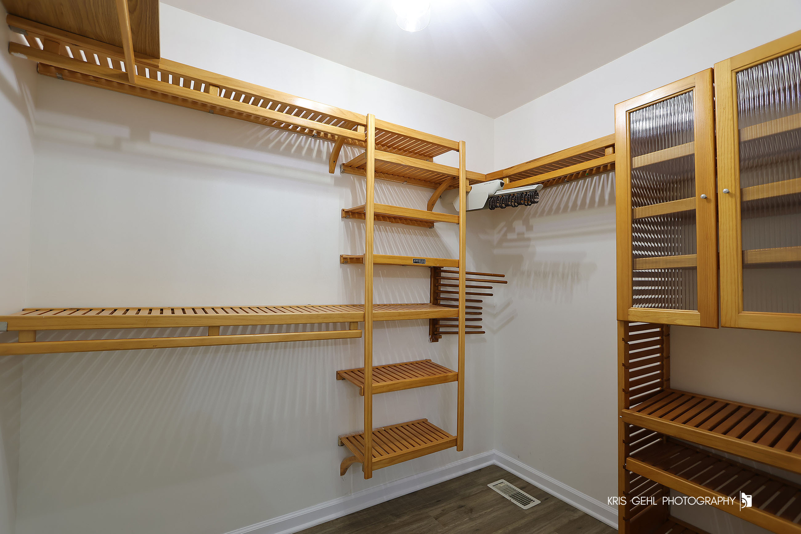 18653 West Willow Point Road Grayslake, IL 60030 - Photo 24 of 49 a view of walk in closet with clothes and shoes