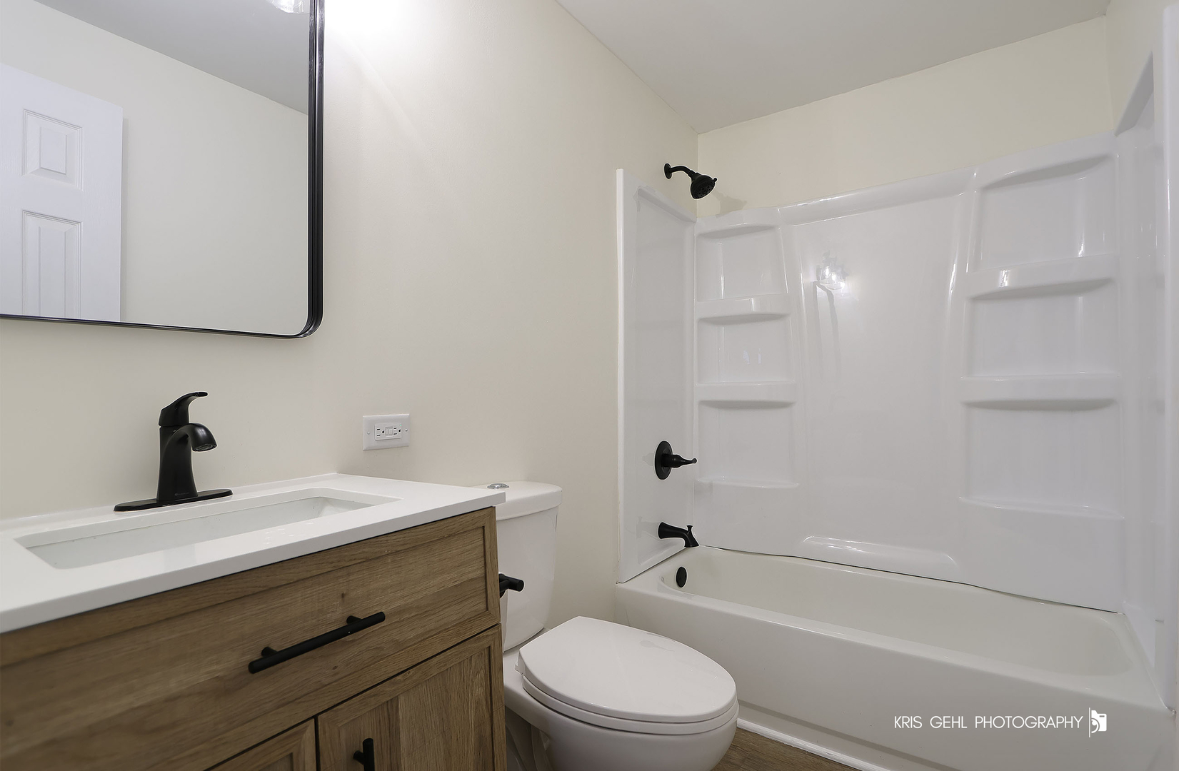 18653 West Willow Point Road Grayslake, IL 60030 - Photo 27 of 49 a bathroom with a sink a toilet and shower