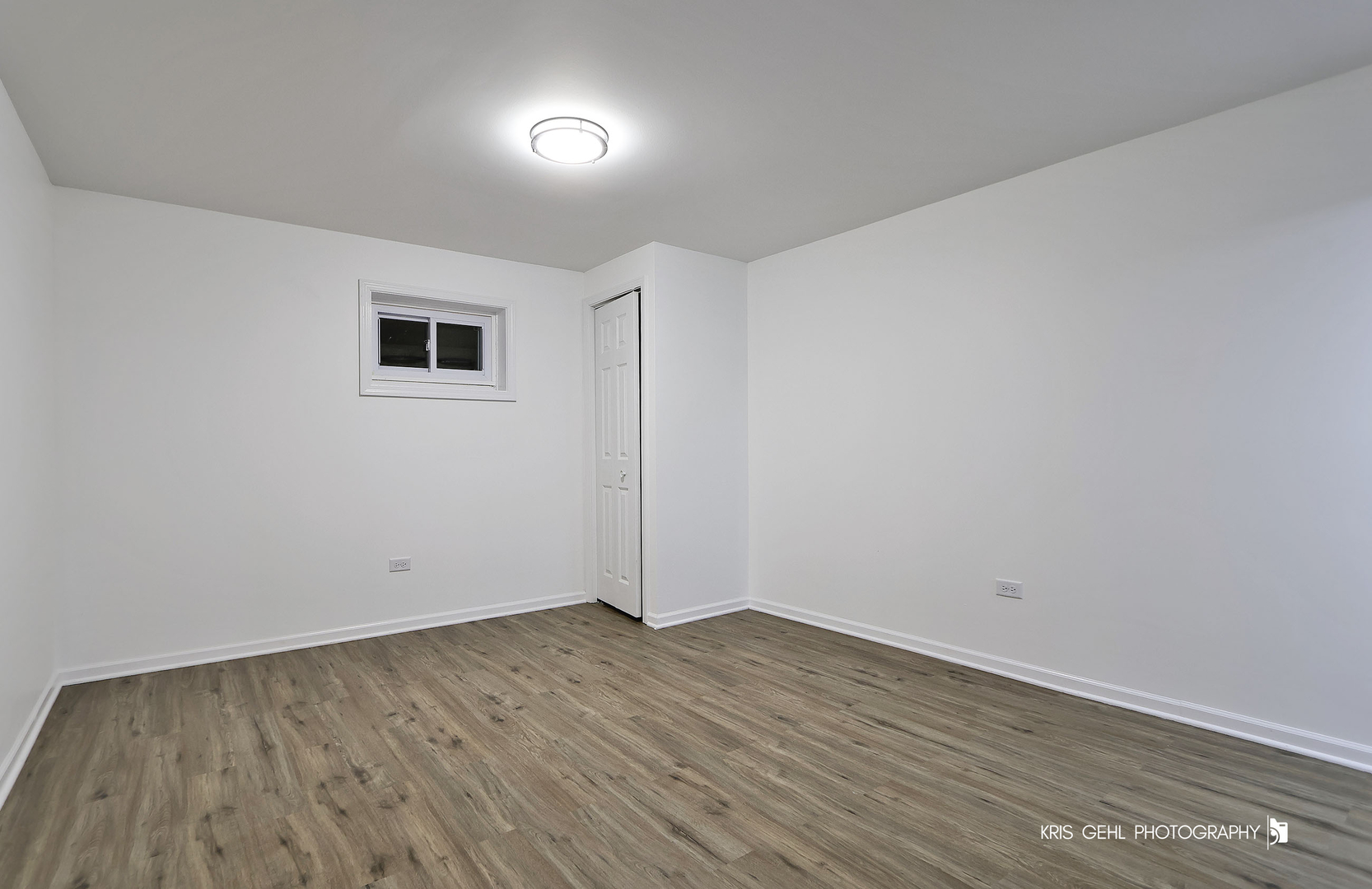 18653 West Willow Point Road Grayslake, IL 60030 - Photo 34 of 49 a view of a room with wooden floor
