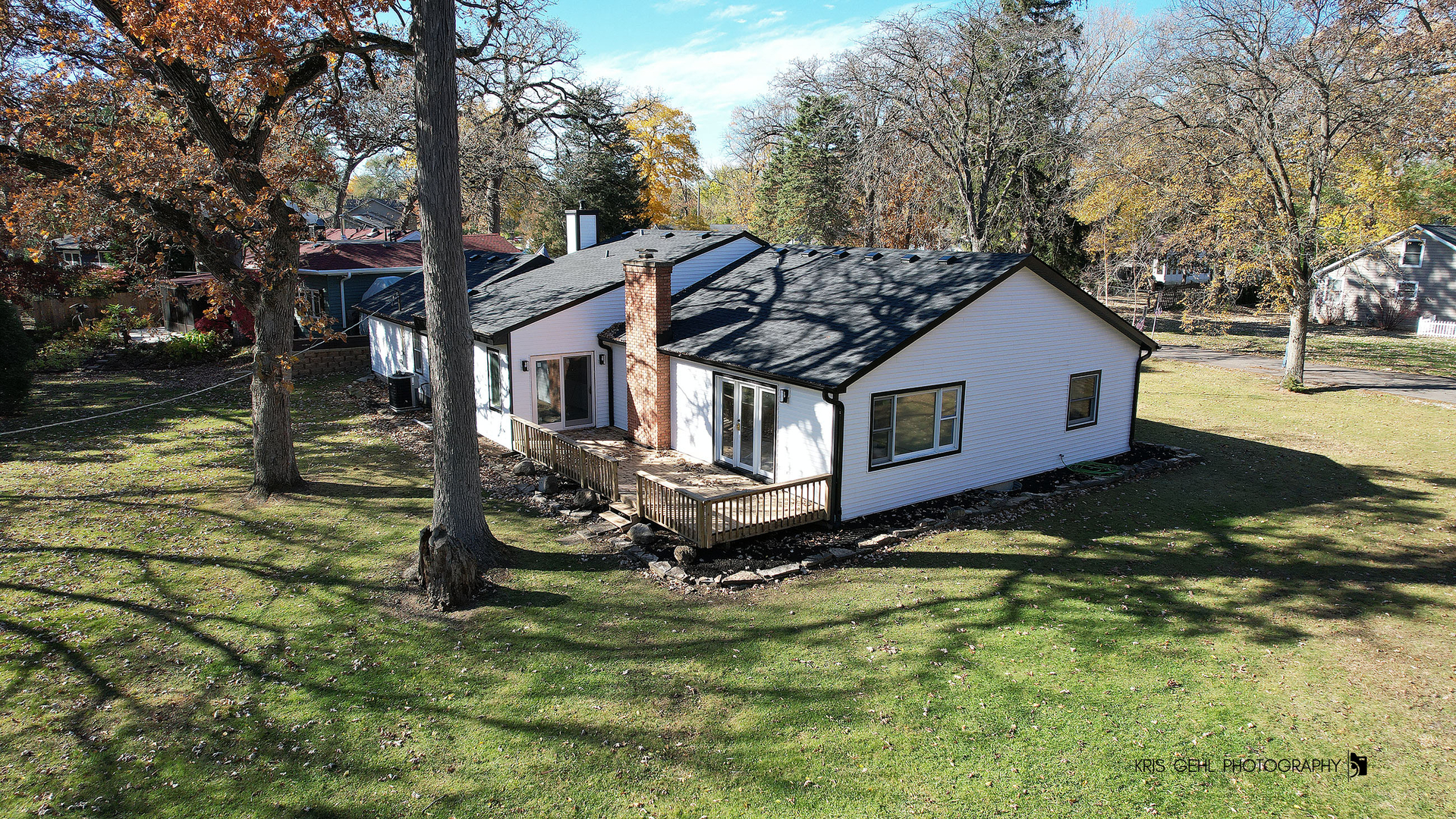 18653 West Willow Point Road Grayslake, IL 60030 - Photo 40 of 49 a house view with a backyard space