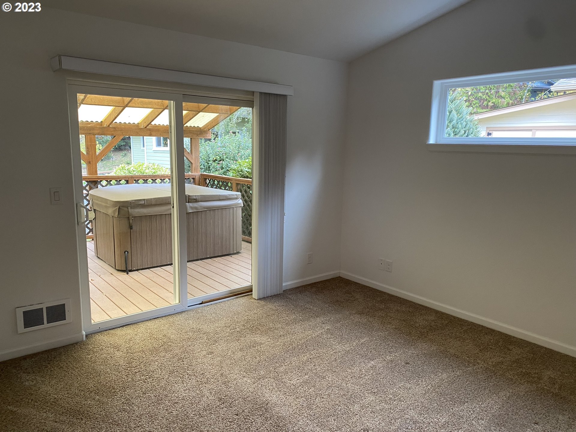 4863 Darlings Loop Florence, OR 97439 - Photo 24 of 47 an empty room with large window