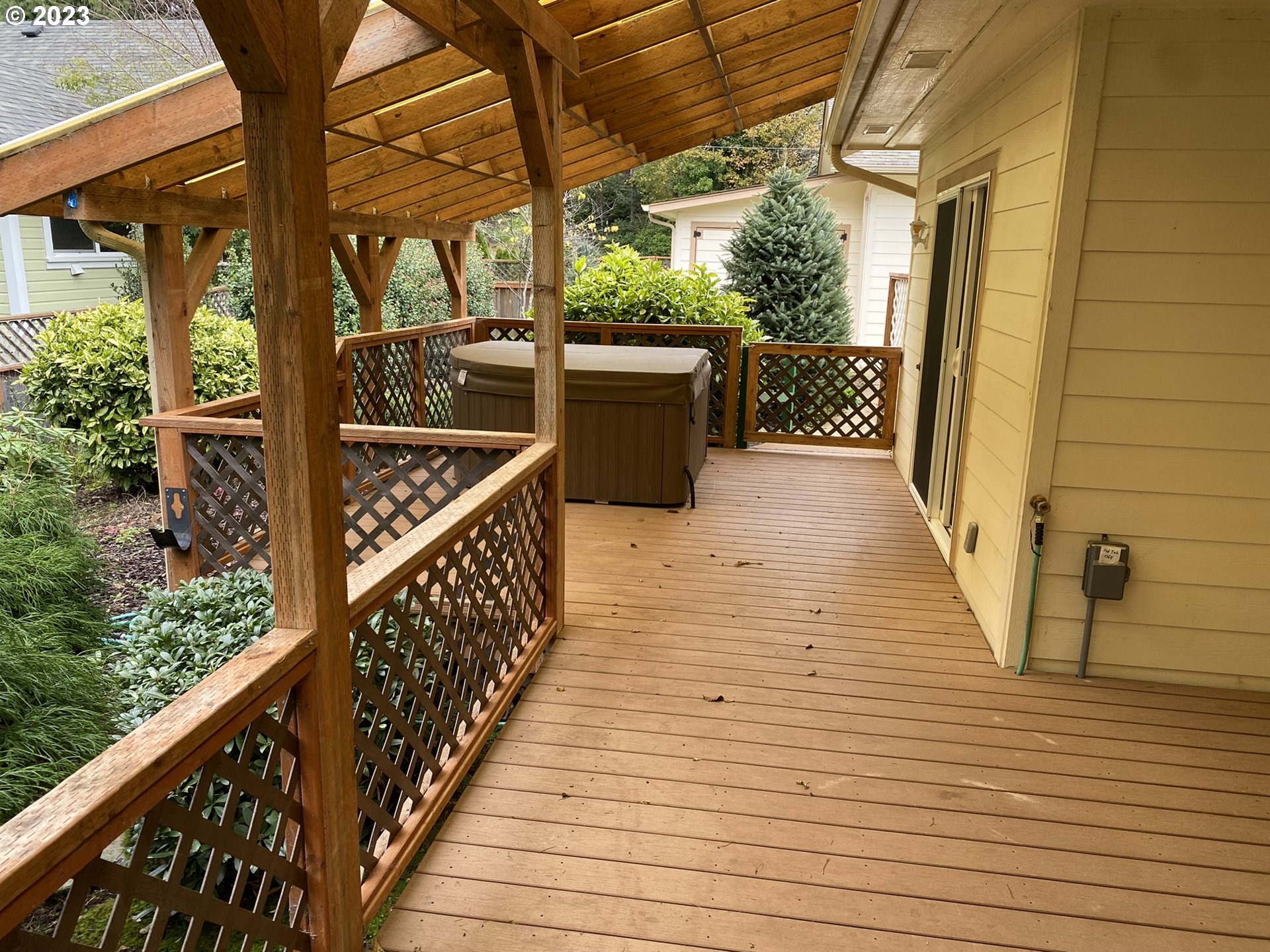 4863 Darlings Loop Florence, OR 97439 - Photo 30 of 47 a view of a balcony with wooden floor