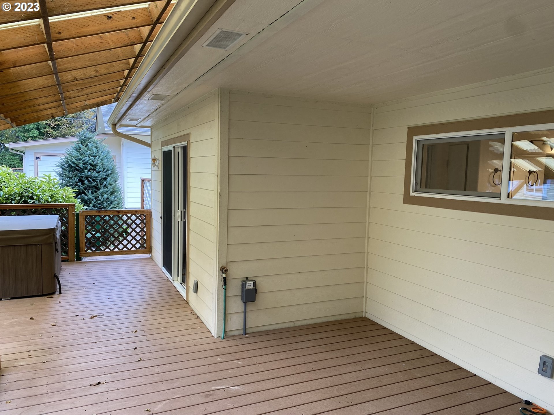 4863 Darlings Loop Florence, OR 97439 - Photo 31 of 47 a view of a backyard with wooden floor and fence