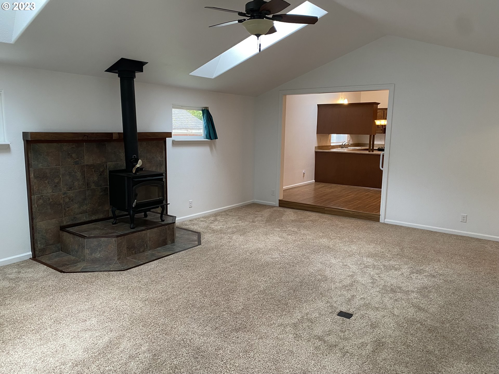 4863 Darlings Loop Florence, OR 97439 - Photo 7 of 47 a living room with hard wood floor